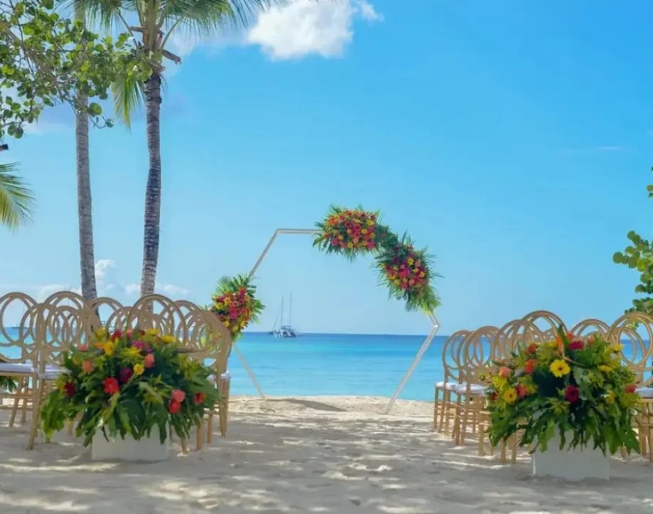 Hexagonal floral arch for a beach ceremony in the Dominican Republic