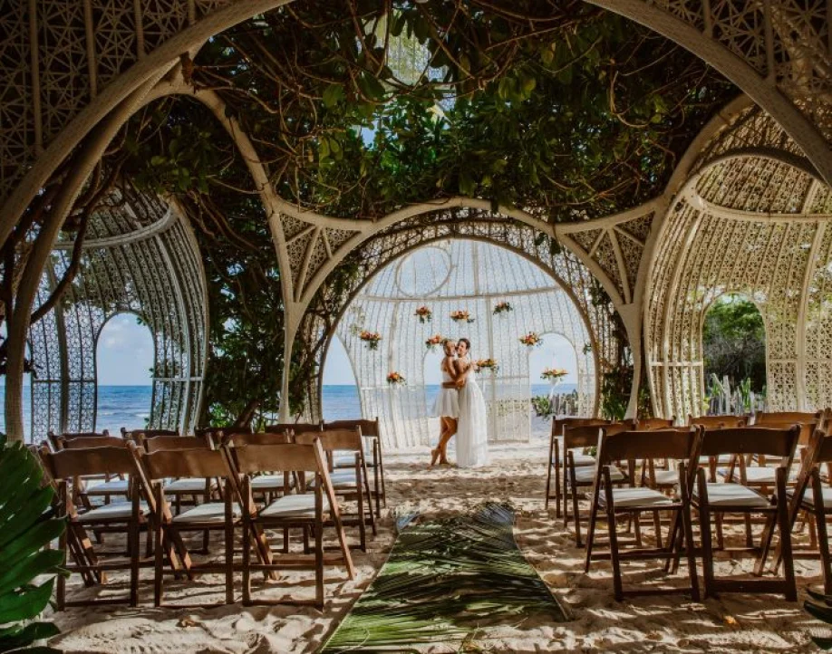 wedding venue at Sandos Caracol with couple at altar