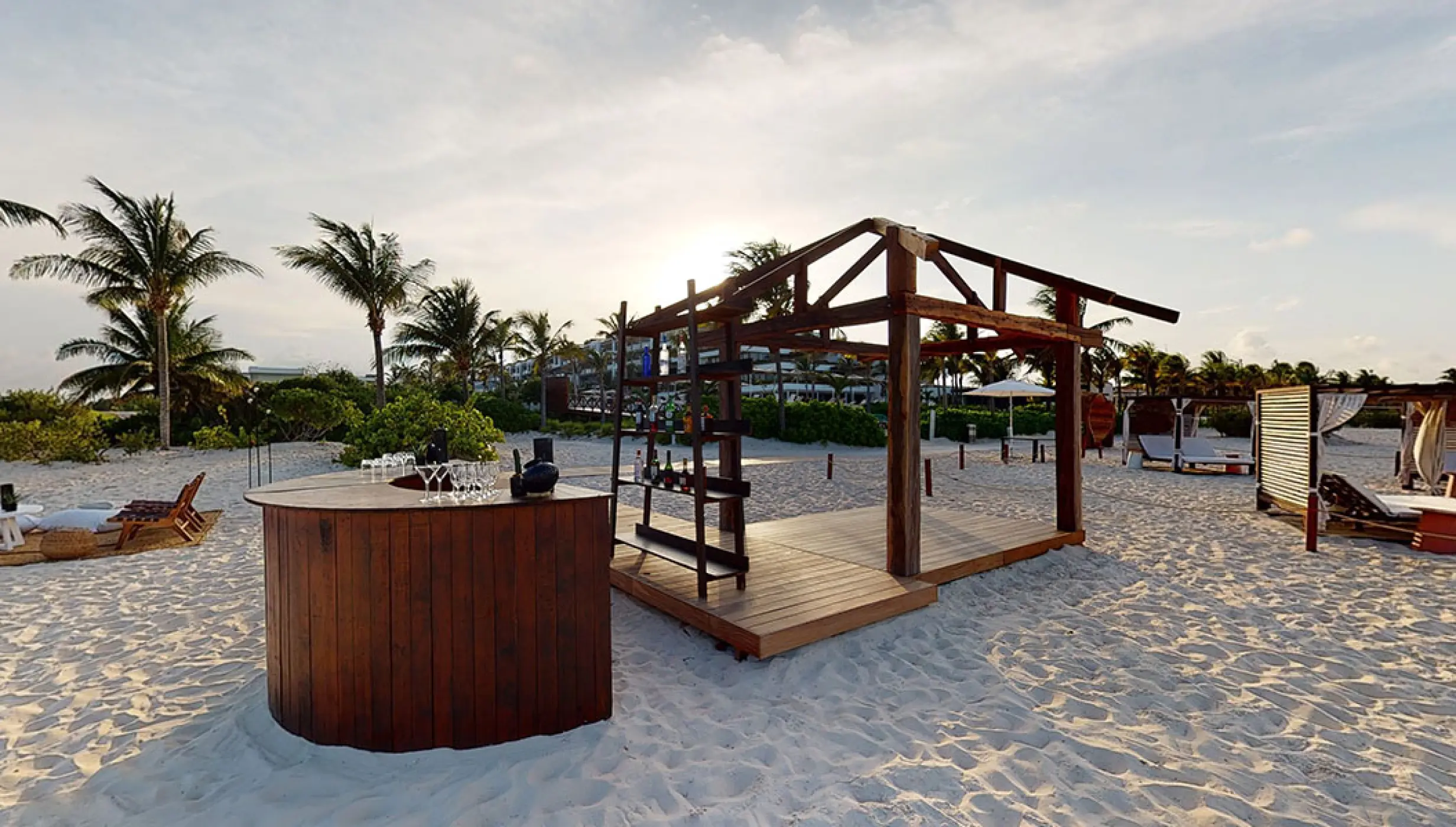 Cocktail setting in beach venue at atelier playa mujeres resort