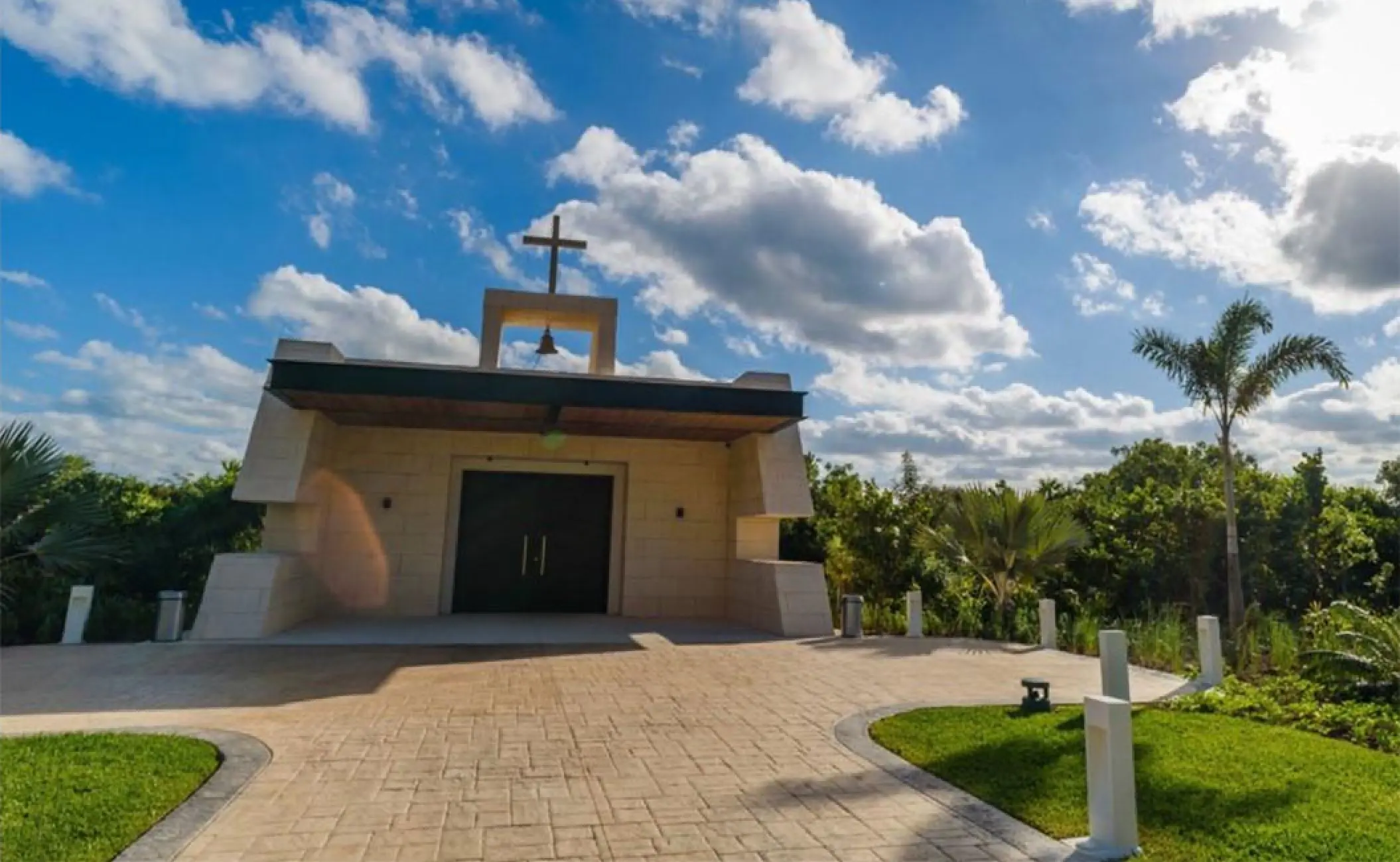 Modern stone wedding chapel exterior at Atelier Playa Mujeres, Cancun