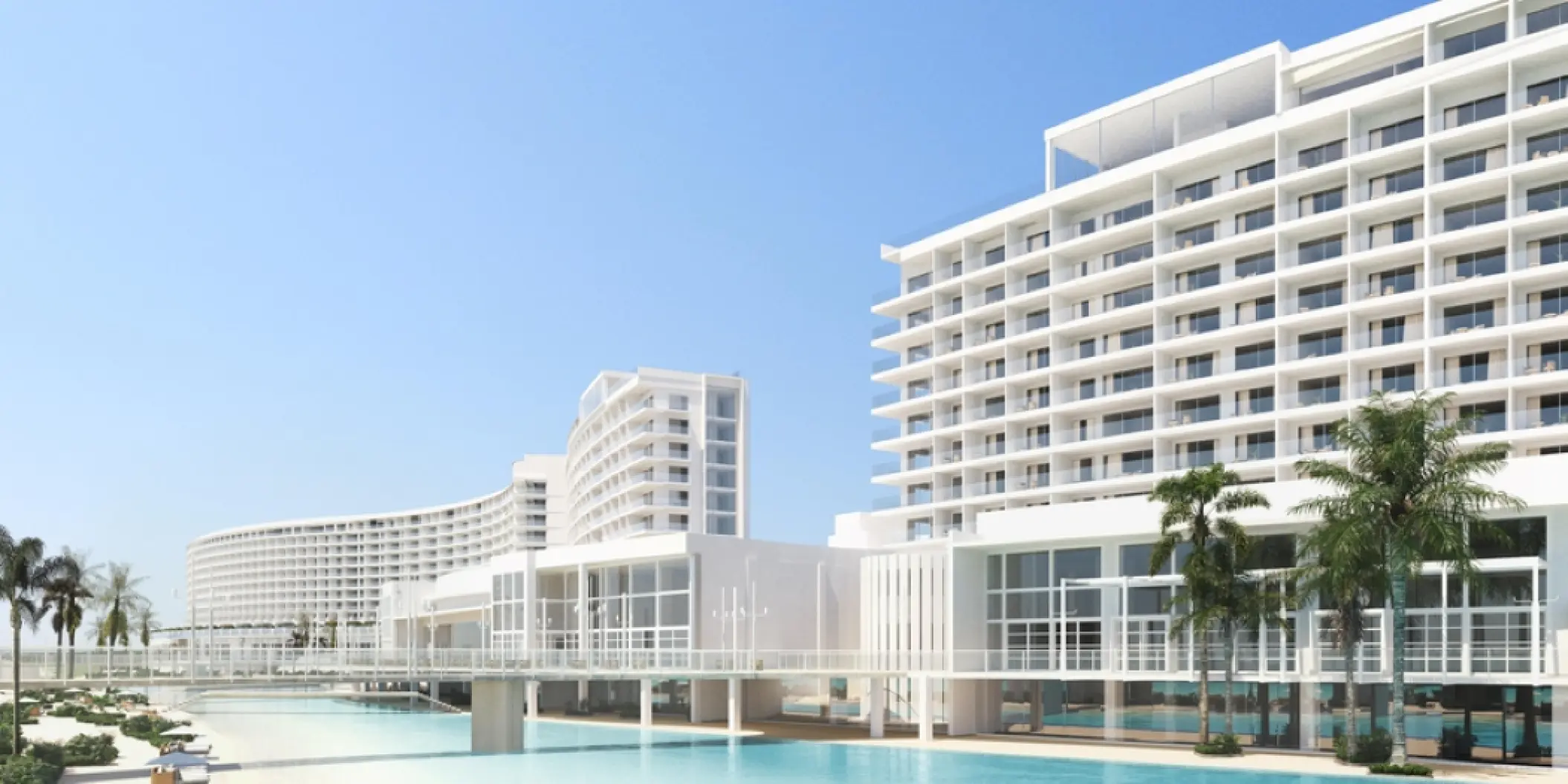 Modern white oceanfront exterior and lagoon pool at AVA Resort Cancun, Cancun