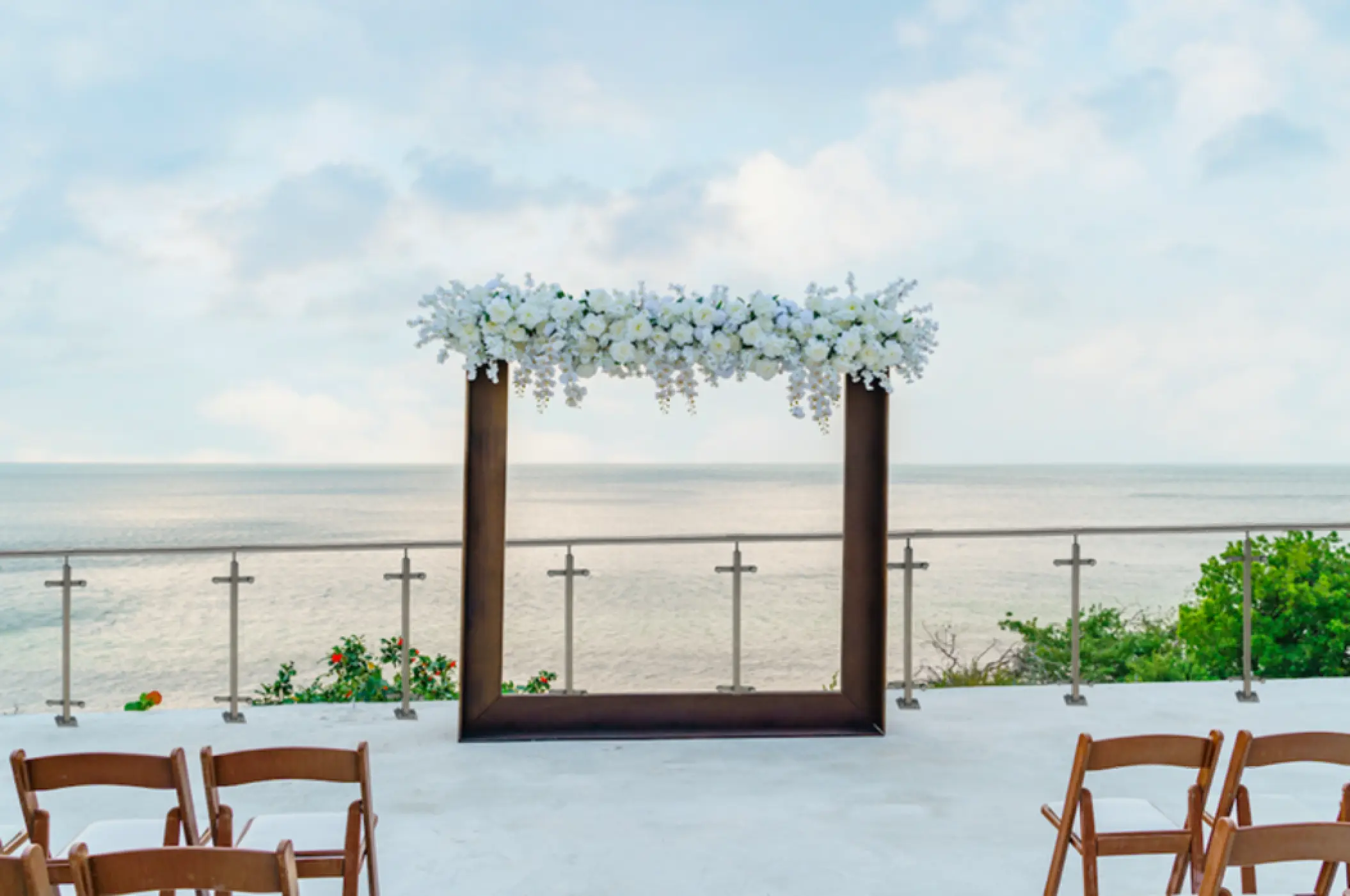 Oceanfront wedding ceremony setup on the lobby terrace at AVA Resort Cancun