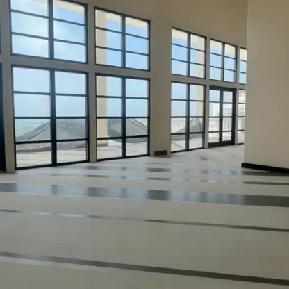 Modern panoramic ballroom with floor-to-ceiling windows at AVA Resort Cancun