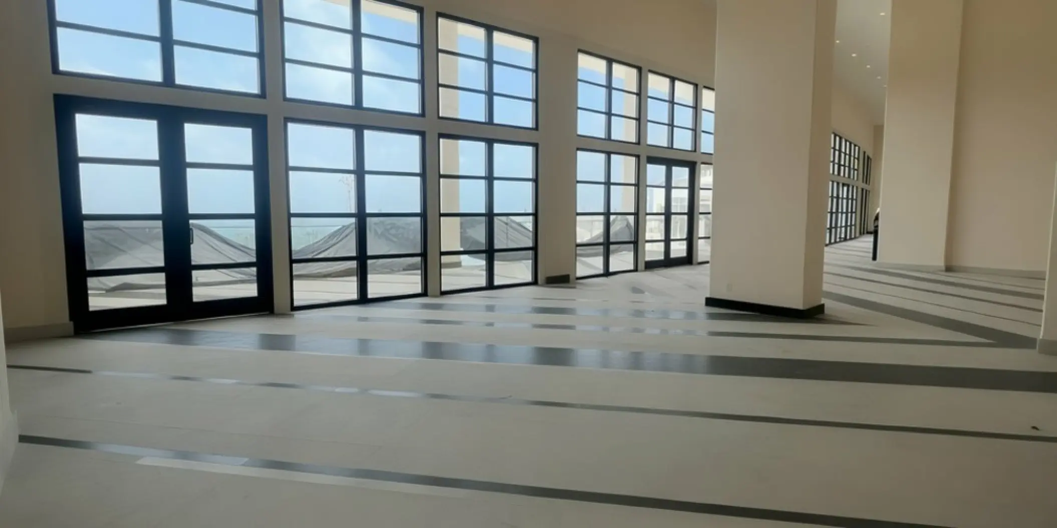 Modern panoramic ballroom with floor-to-ceiling windows at AVA Resort Cancun