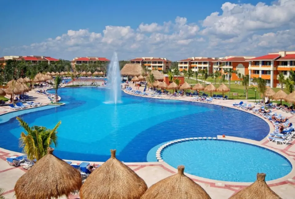 pool and buildings at Bahia Principe Grand Coba