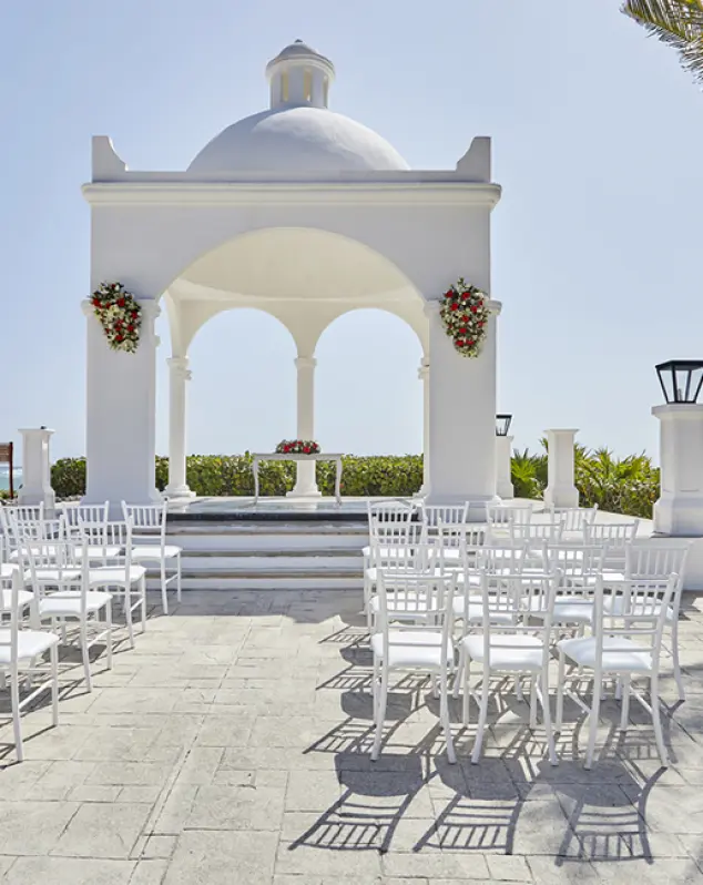 White beachfront gazebo wedding ceremony at Bahia Principe Akumal, Tulum