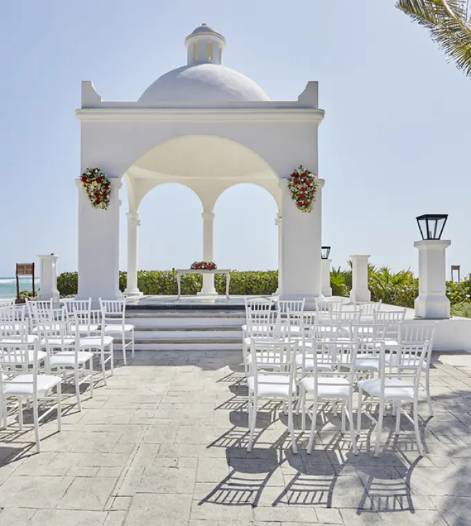 White beachfront gazebo wedding ceremony at Bahia Principe Akumal, Tulum