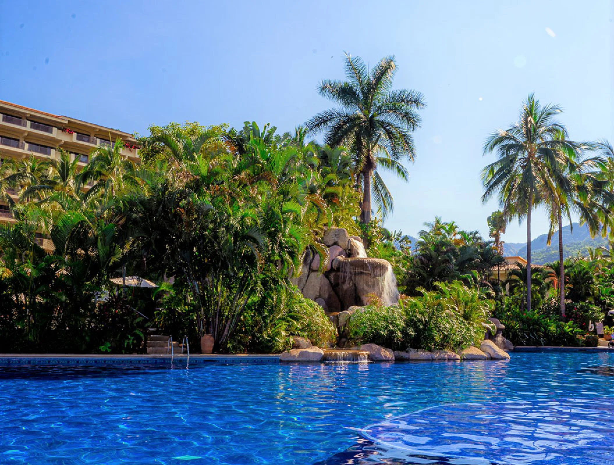 Barcelo Puerto Vallarta resort gardens and pool.