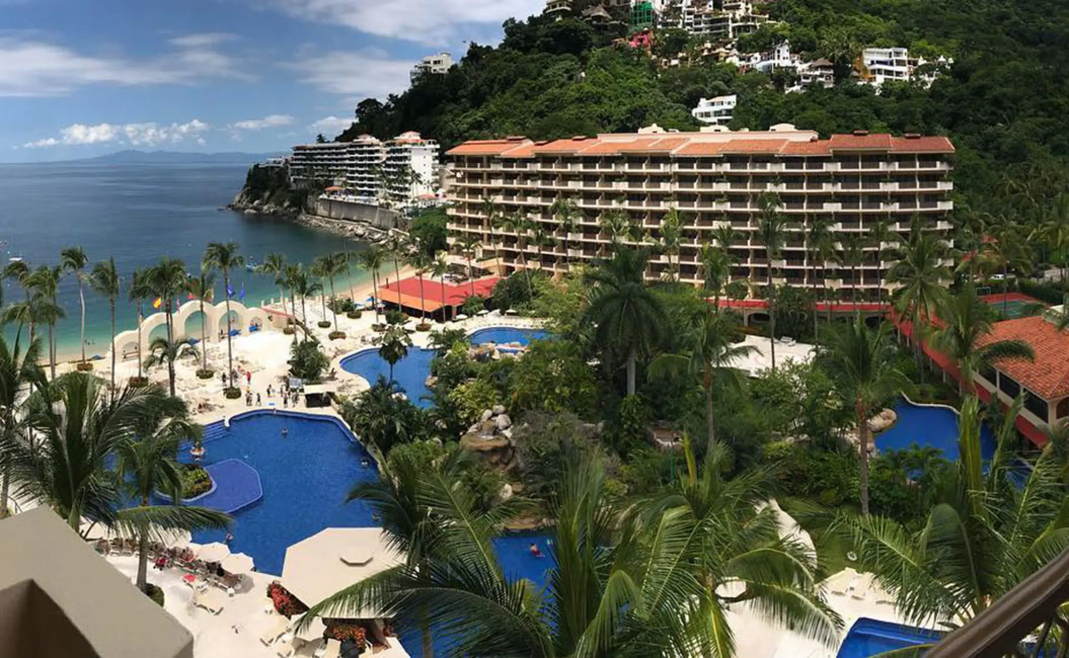 Elevated view of swimming pools and resort grounds at Barcelo Puerto Vallarta