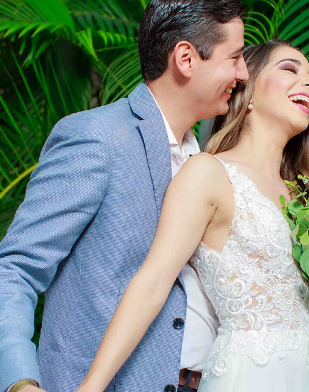 Couple posing at La Plazita wedding venue in Barcelo Puerto Vallarta