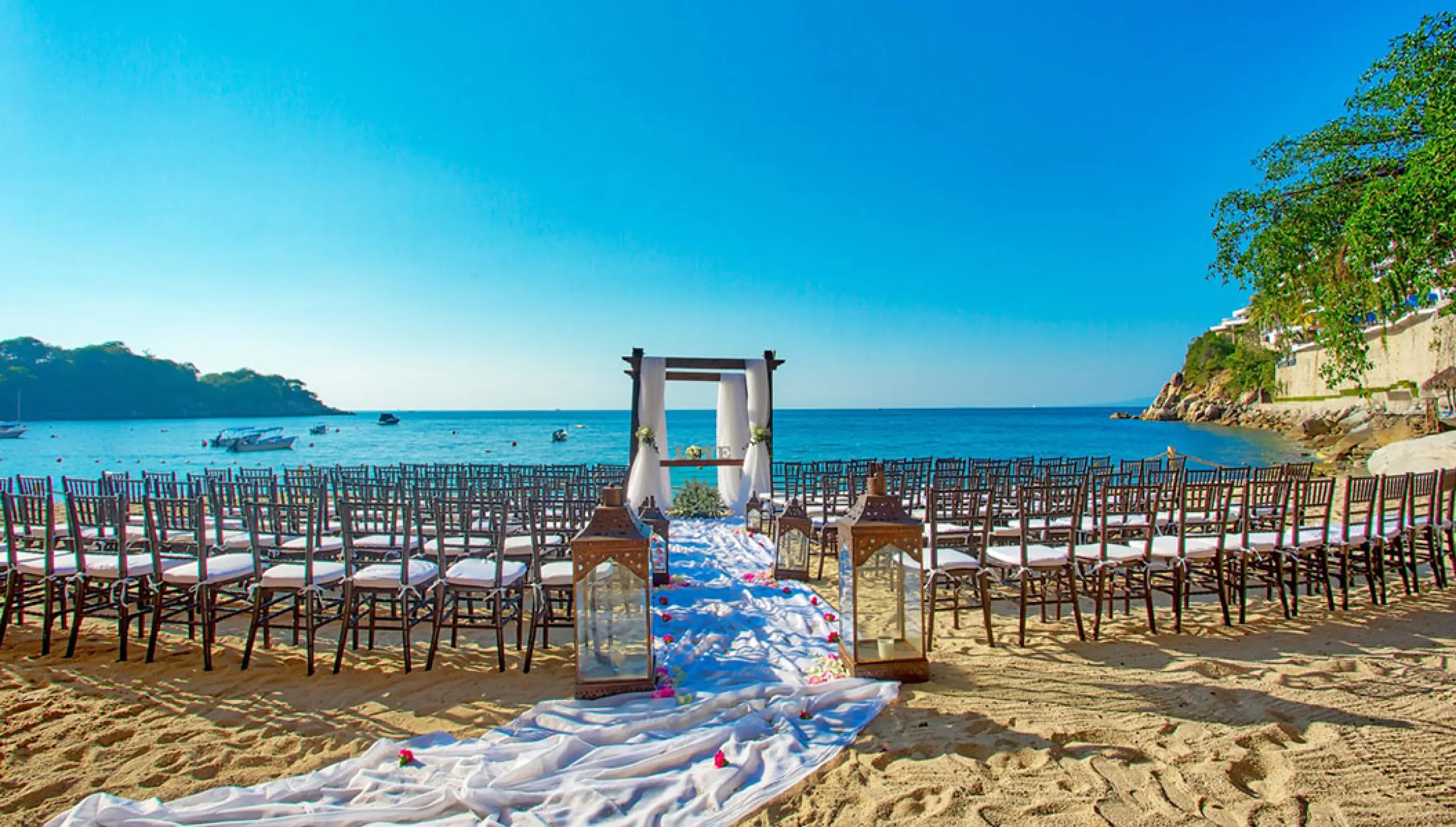 Beach wedding ceremony setup at Barcelo Puerto Vallarta, Puerto Vallarta