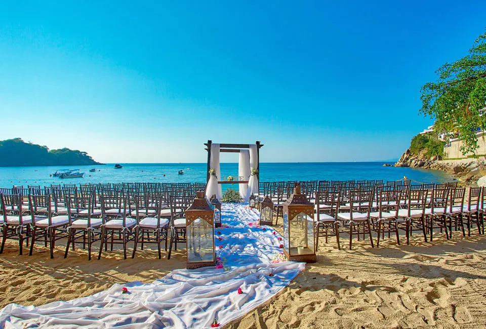 Wedding ceremony setup at Beach Venue in Barcelo Puerto Vallarta resort