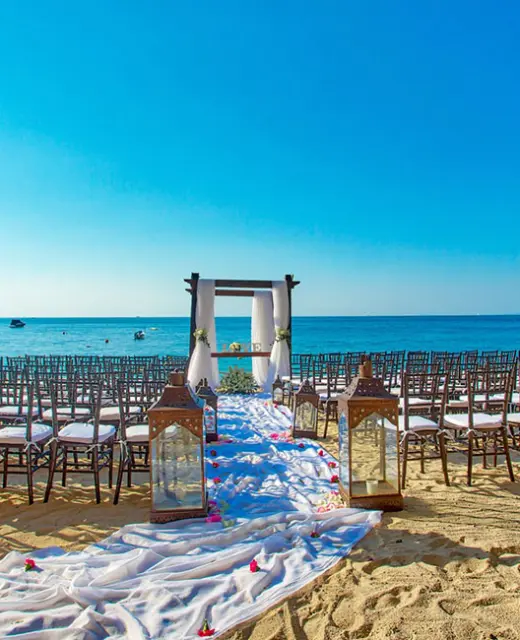 Wedding ceremony setup at Beach Venue in Barcelo Puerto Vallarta resort