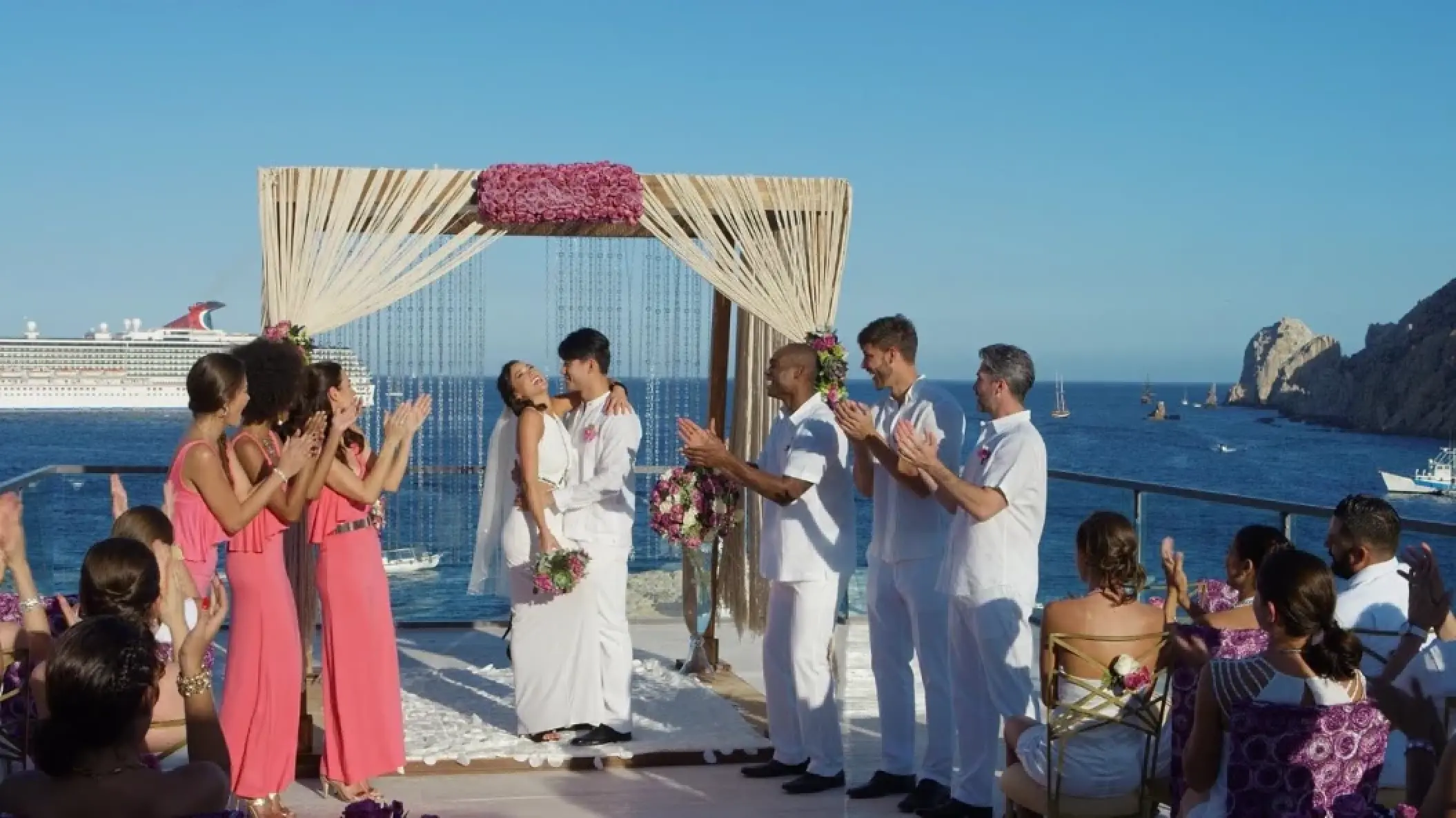 The couple kissing during a terrace wedding ceremony at Breathless Cabo San Lucas, Cabo San Lucas