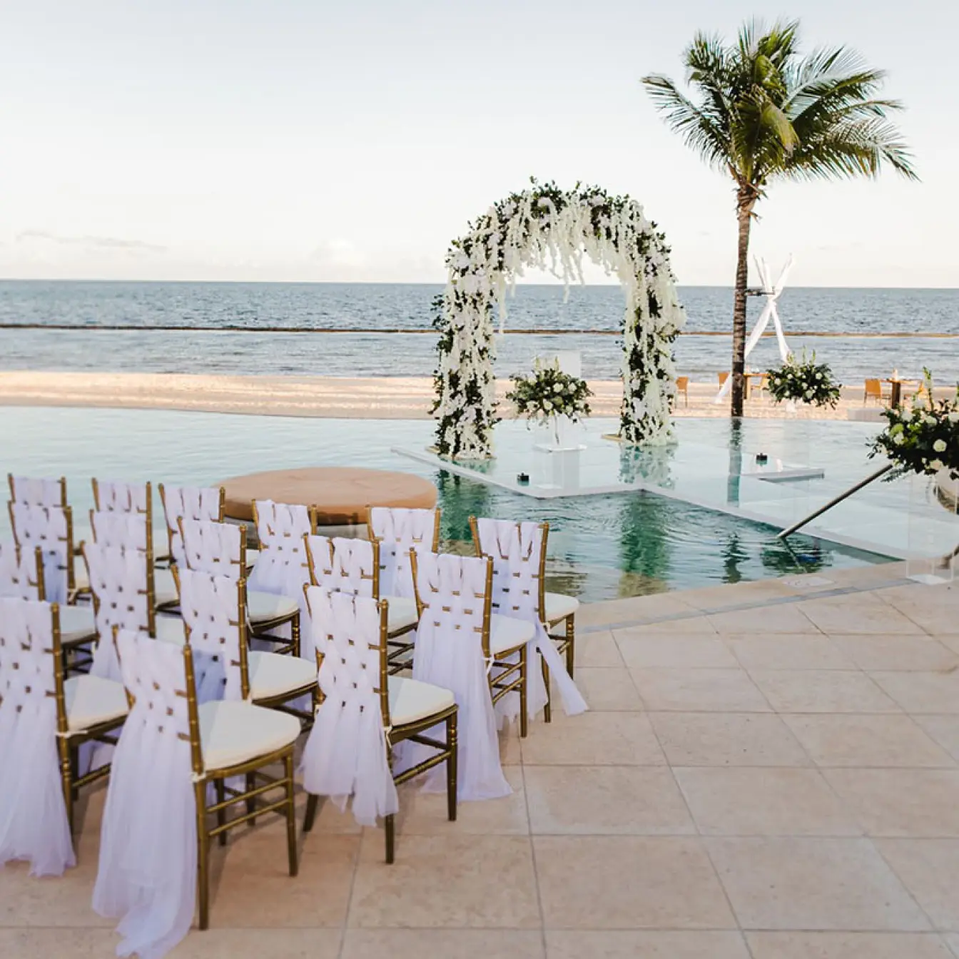 Over the water wedding venue at Breathless Riviera Cancun resort.