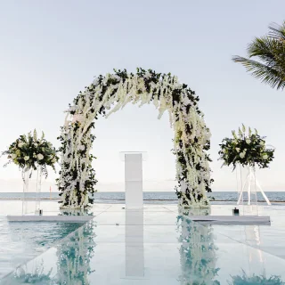 Over the water wedding venue at Breathless Riviera Cancun resort.