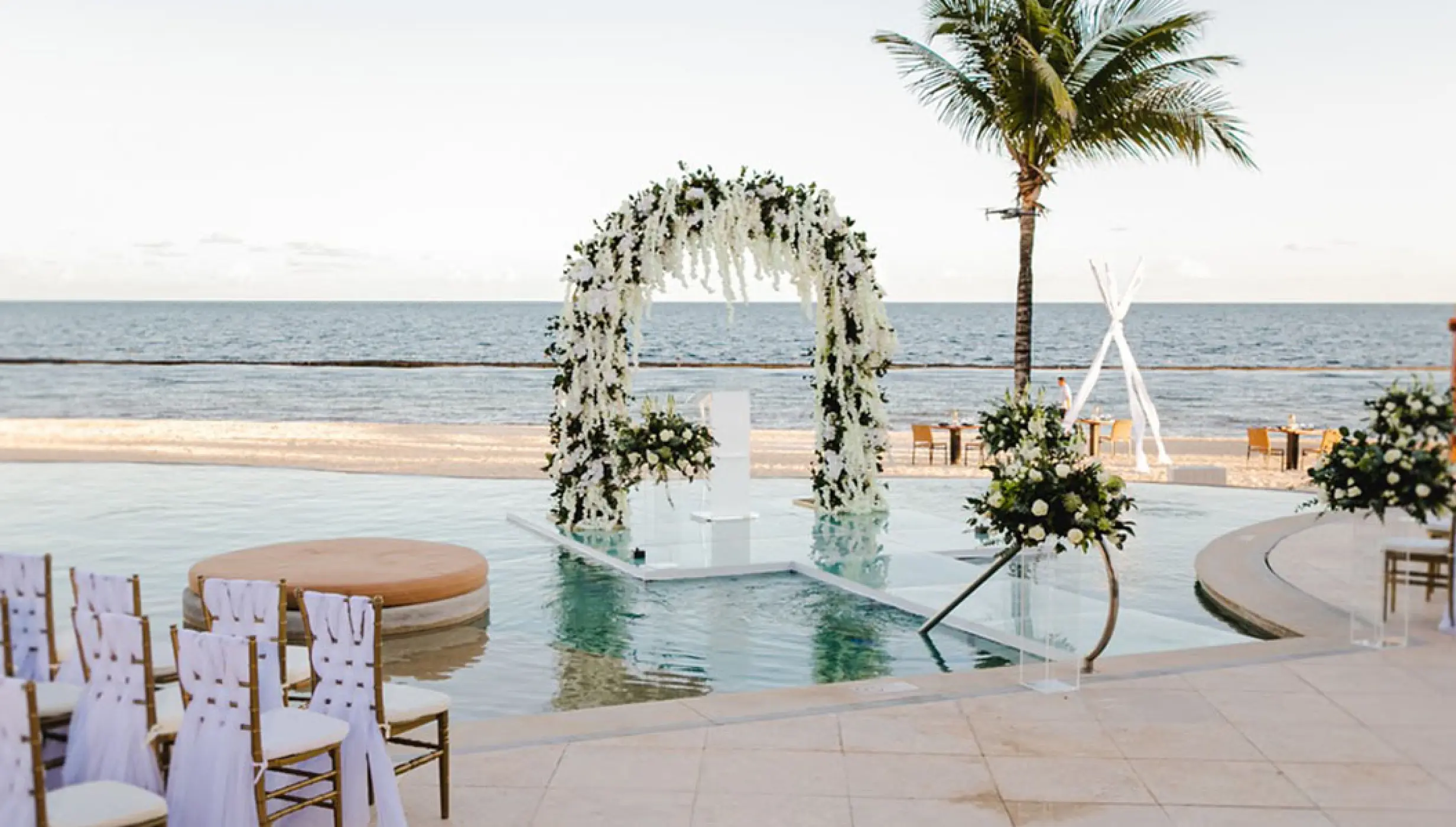 Over the water wedding venue at Breathless Riviera Cancun resort.