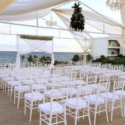 Oceanfront wedding ceremony under a white canopy at Breathless Riviera Cancun, Riviera Maya