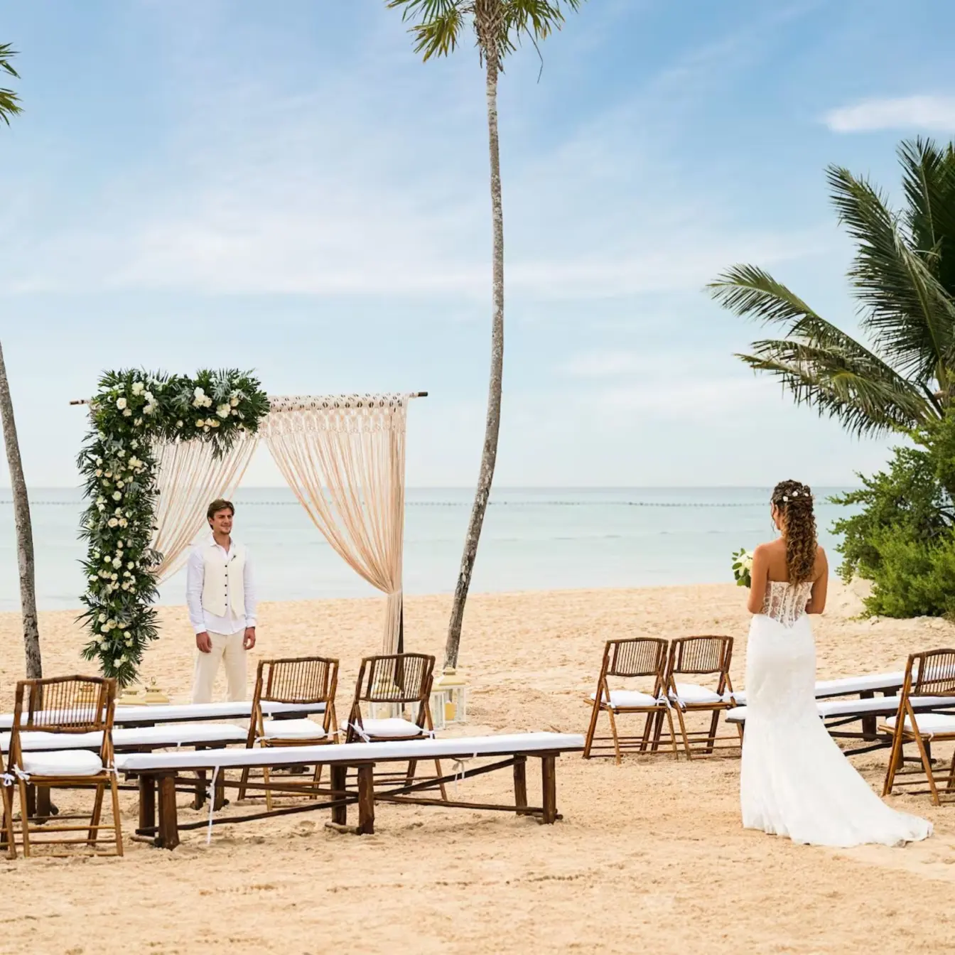 Bride walking toward the groom at a beach ceremony at Paradisus Playa del Carmen