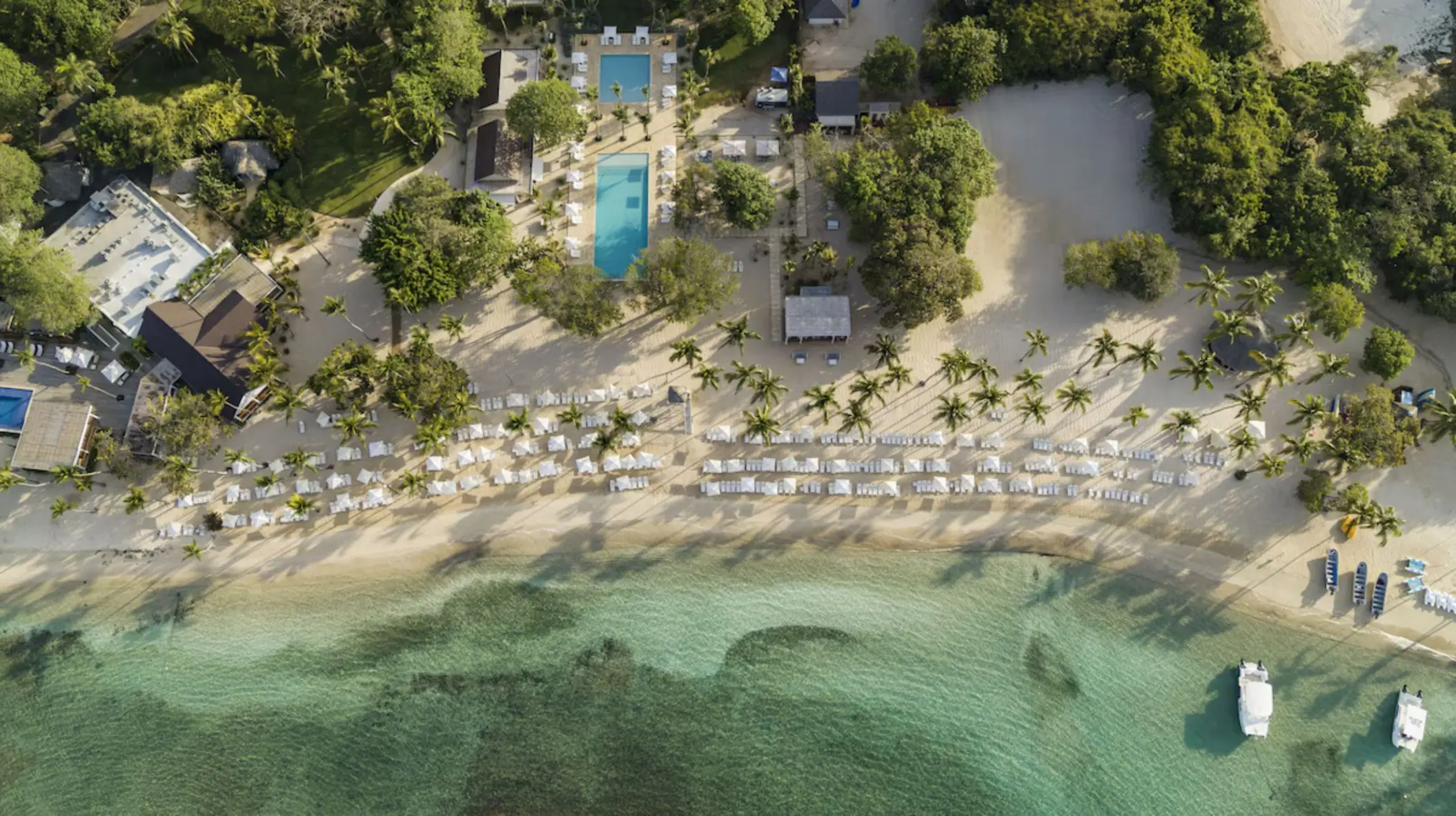 Aerial view of the private beach and swimming pools at Casa de Campo, La Romana
