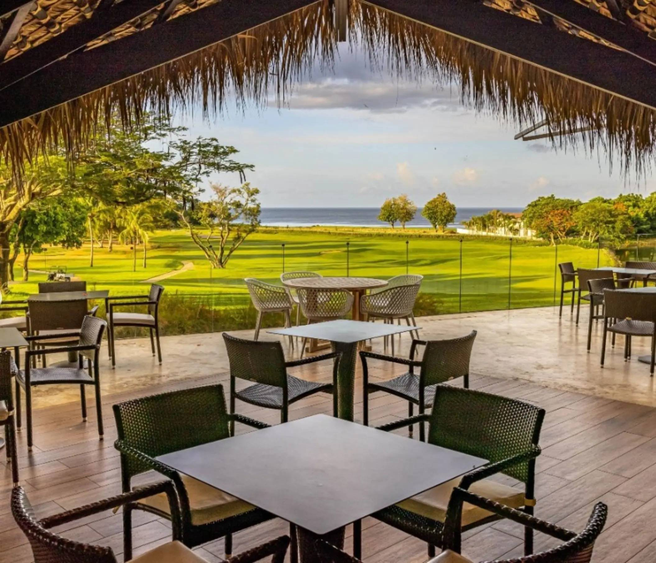 Lago Restaurant terrace overlooking the golf course and sea at Casa de Campo, La Romana