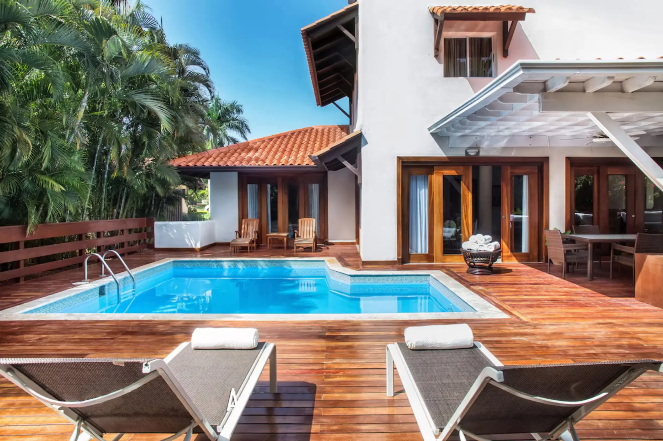 Private villa pool and wooden deck at Casa de Campo, La Romana