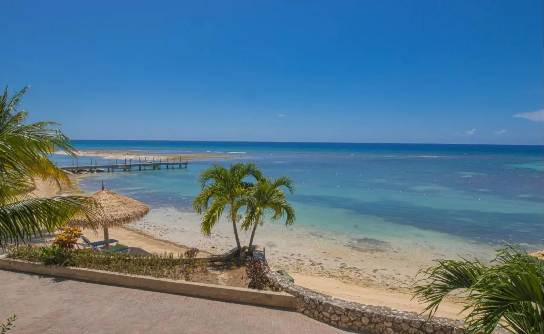 Private beach and wooden pier at Catalonia Montego Bay, Montego Bay
