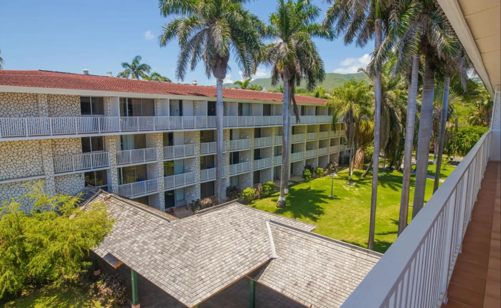 Terraced guest room buildings and tropical gardens at Catalonia Montego Bay, Montego Bay