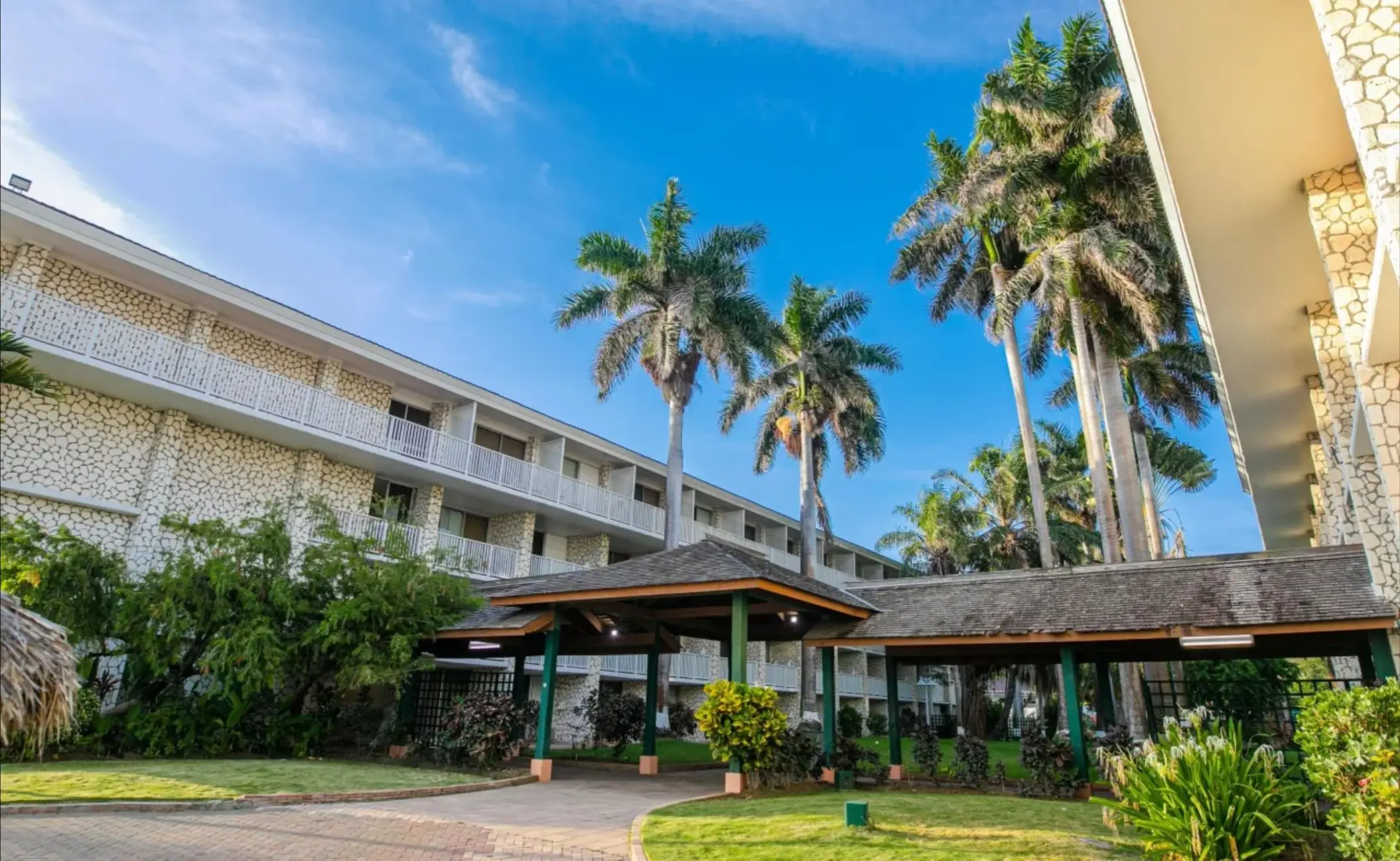 Catalonia Montego Bay exterior buildings and palm trees, Montego Bay