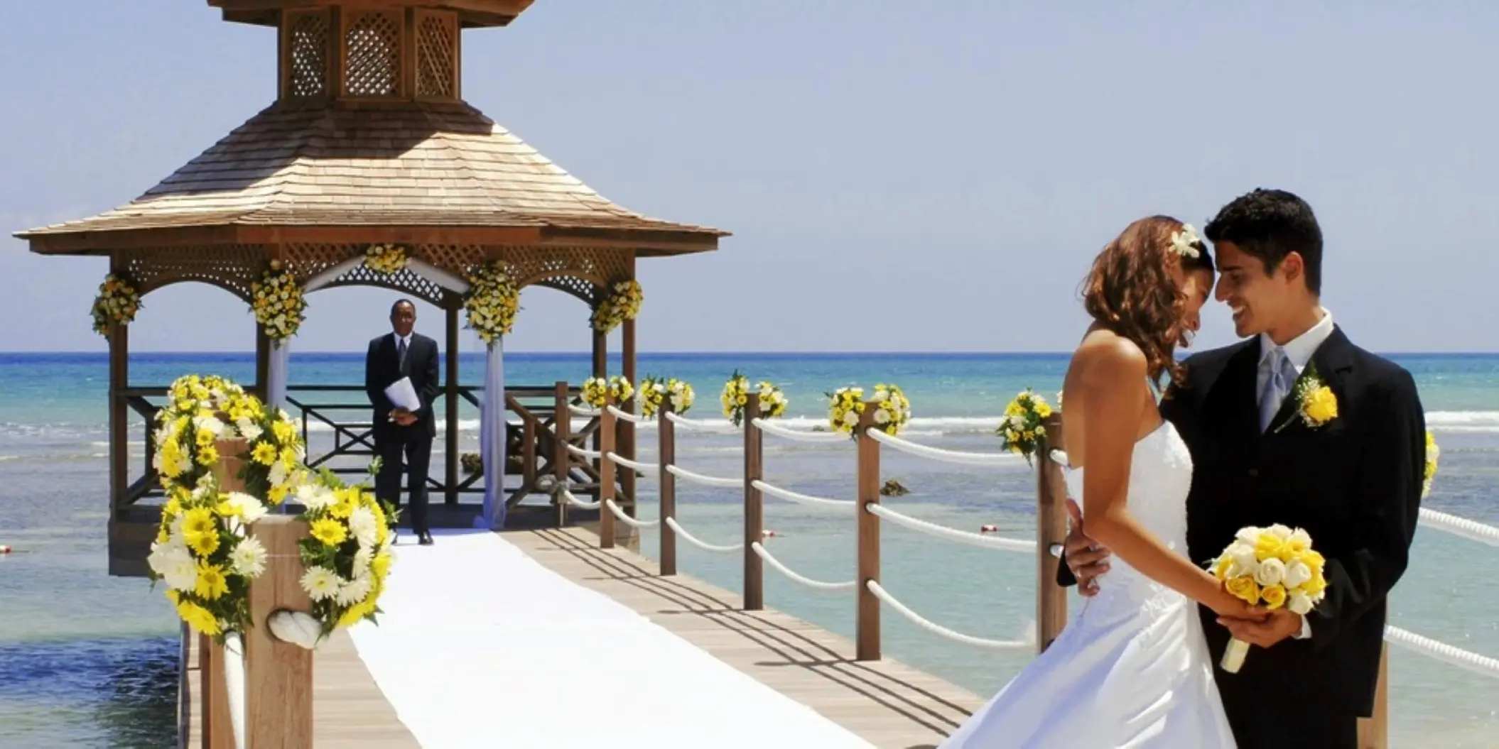 Wedding ceremony at the Coral Gazebo over the water at Catalonia Montego Bay