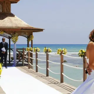 Wedding ceremony at the Coral Gazebo over the water at Catalonia Montego Bay