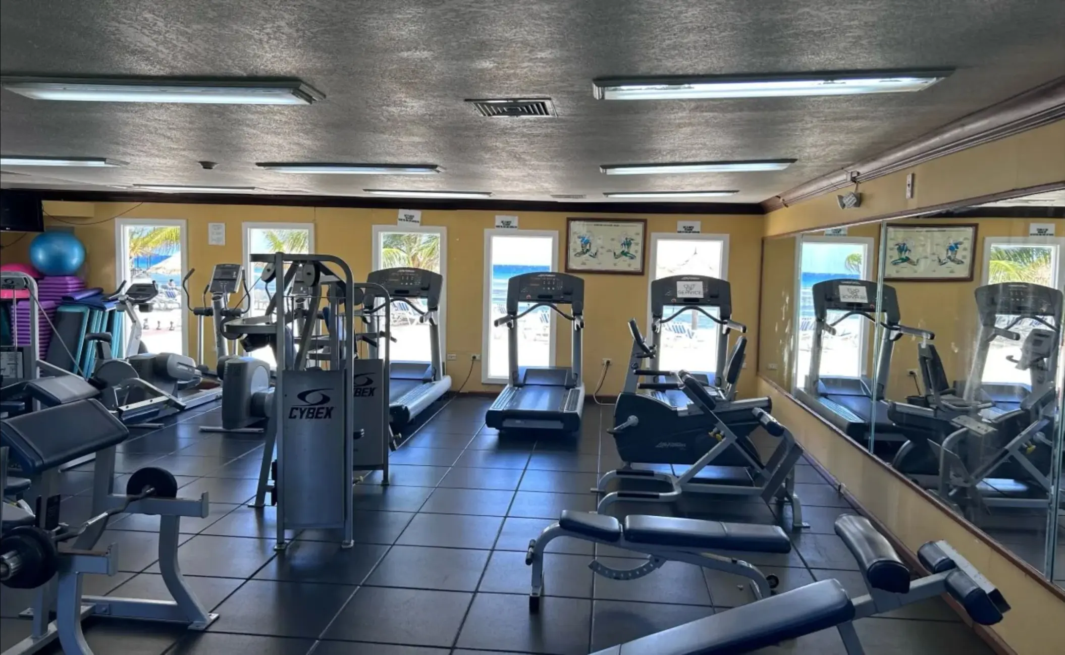 Weight machines and treadmills in the gym at Catalonia Montego Bay