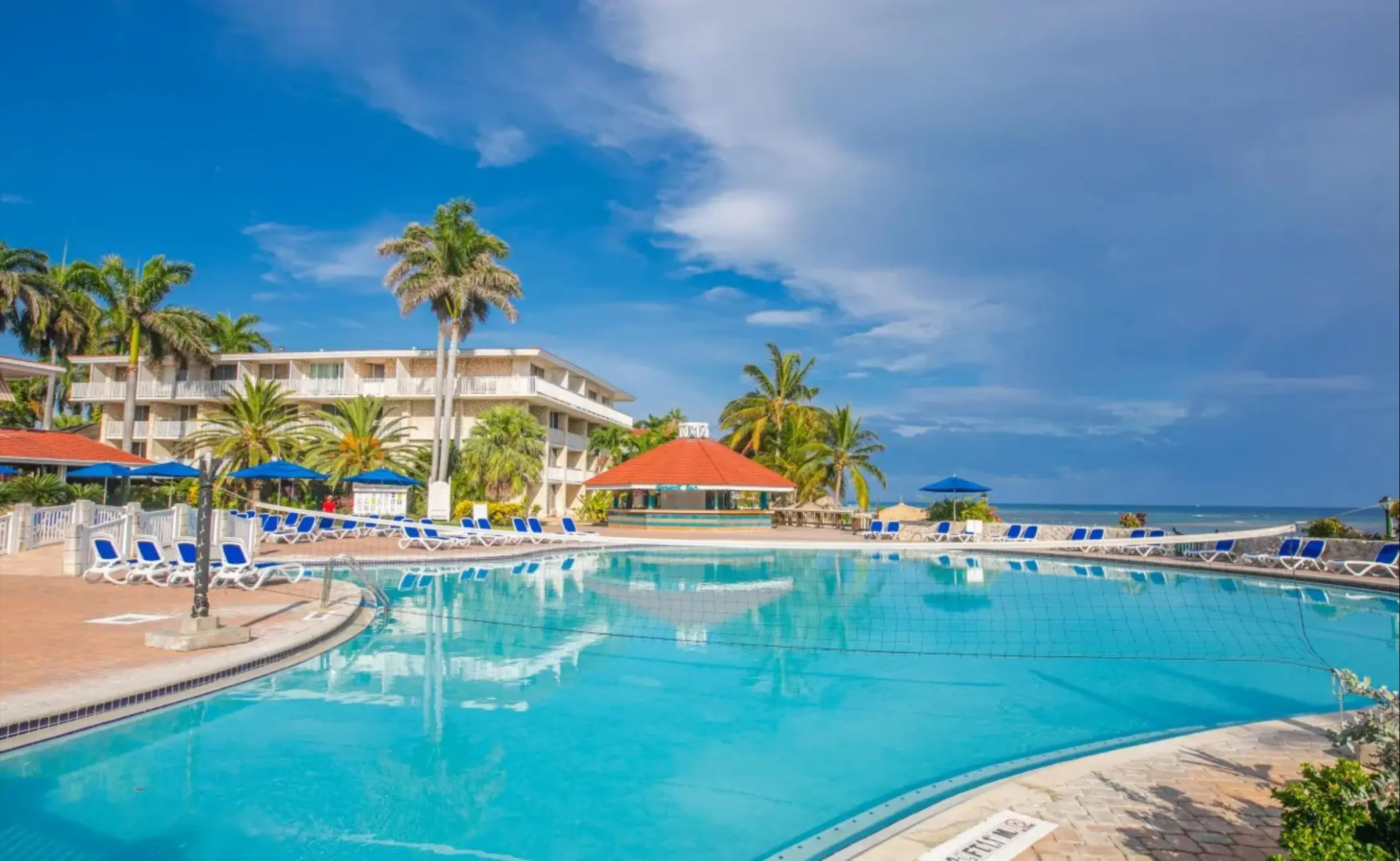 Catalonia Montego Bay swimming pool with a volleyball net and ocean views, Montego Bay