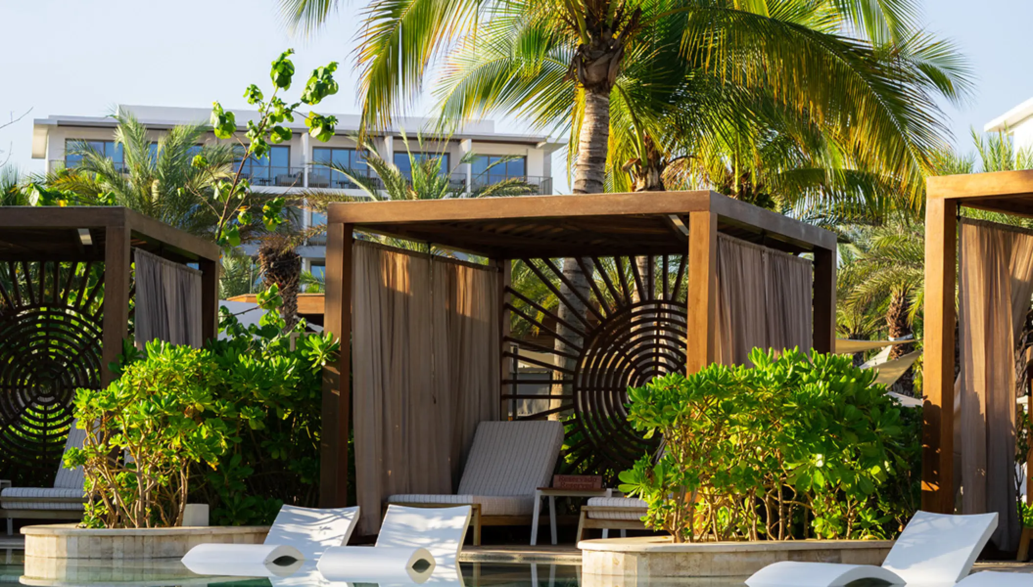Private poolside cabanas with sun loungers at Conrad Punta de Mita, Puerto Vallarta