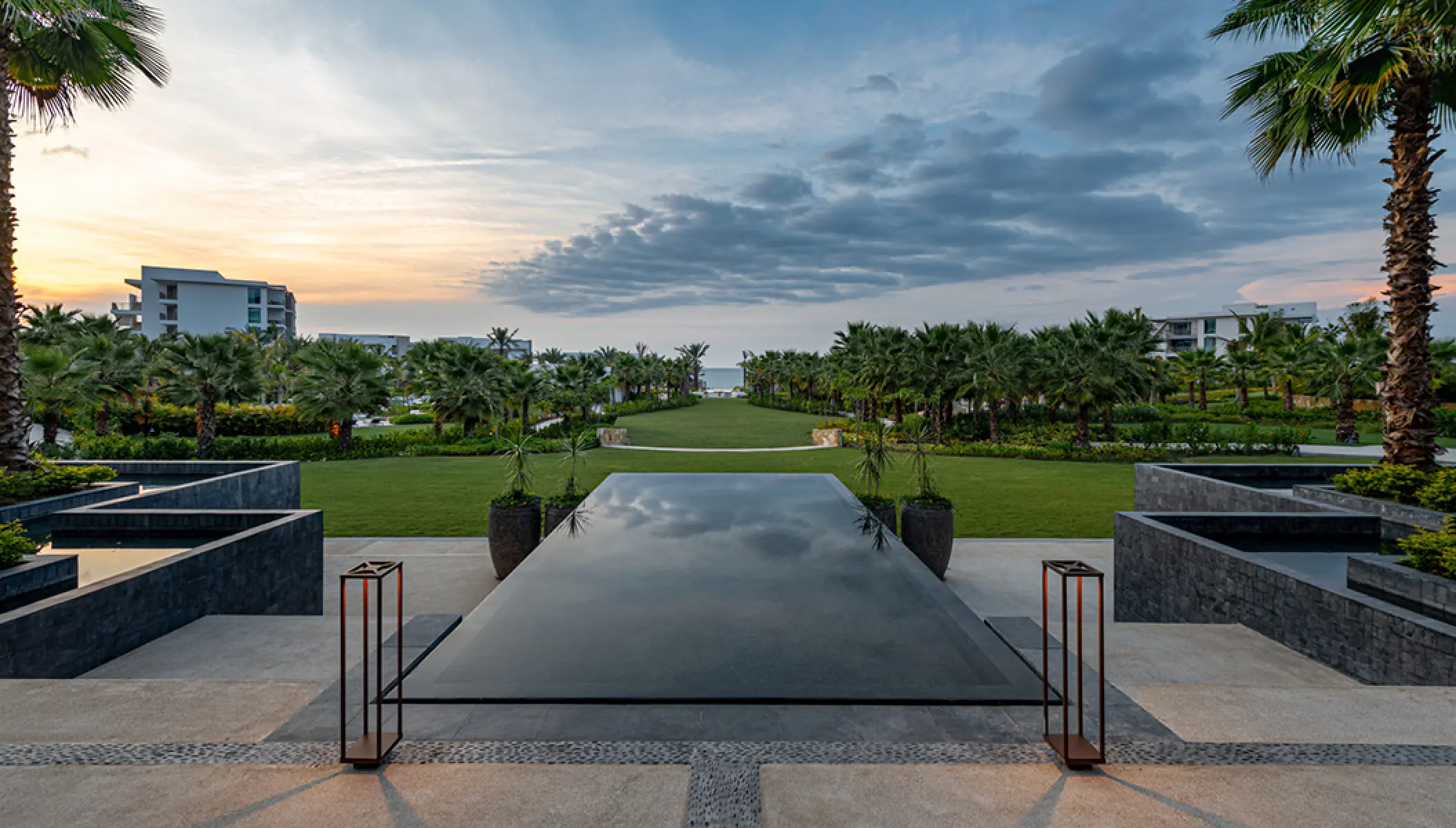 Espejo de agua water feature reflecting the sunset sky at Conrad Punta de Mita, Puerto Vallarta