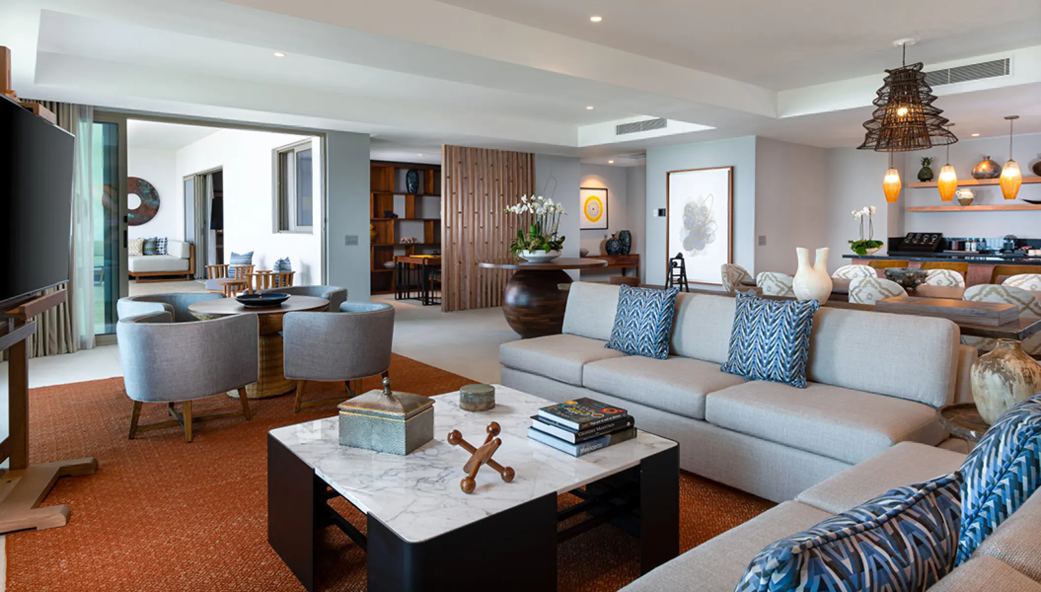 Penthouse suite living room with modern seating and balcony at Conrad Punta de Mita, Puerto Vallarta