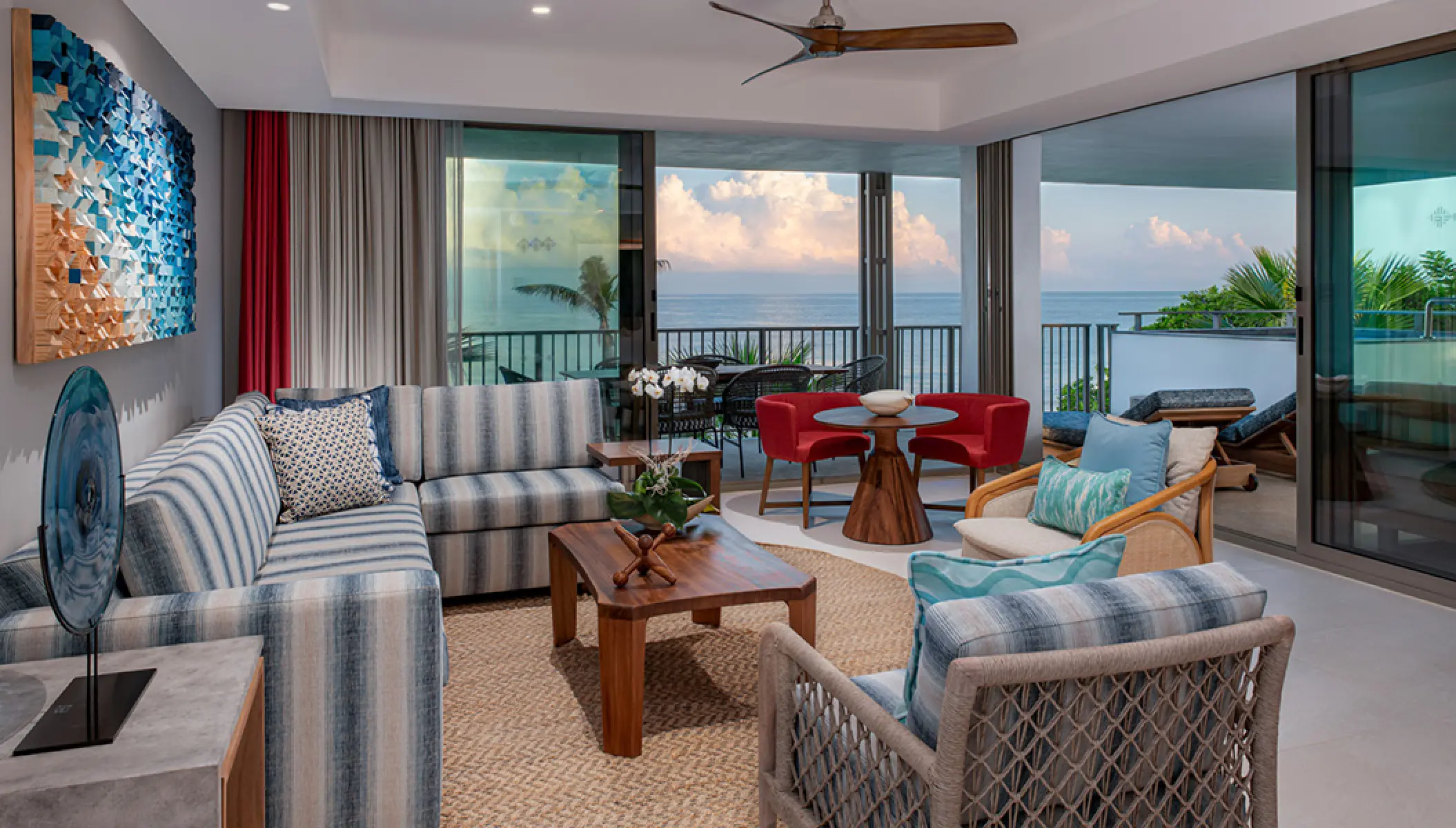 Premiere Suite living room with ocean-view balcony at Conrad Punta de Mita, Puerto Vallarta