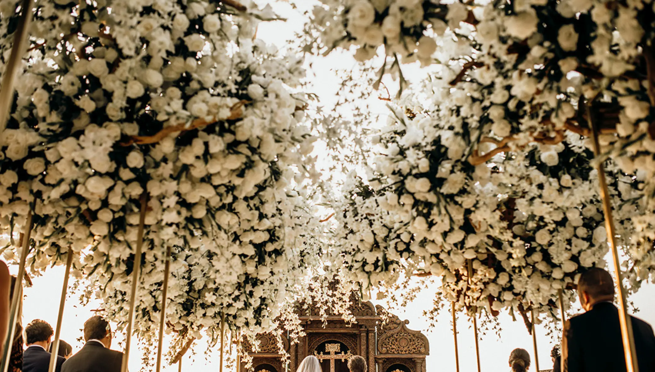 White floral canopy at a wedding ceremony at Conrad Punta de Mita, Puerto Vallarta