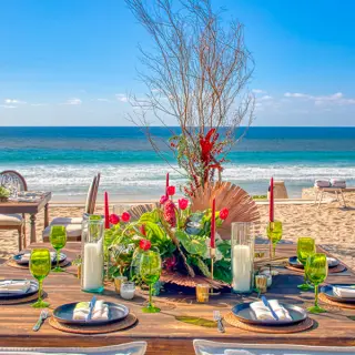 Beachfront wedding reception dinner setup at Conrad Punta de Mita, Puerto Vallarta