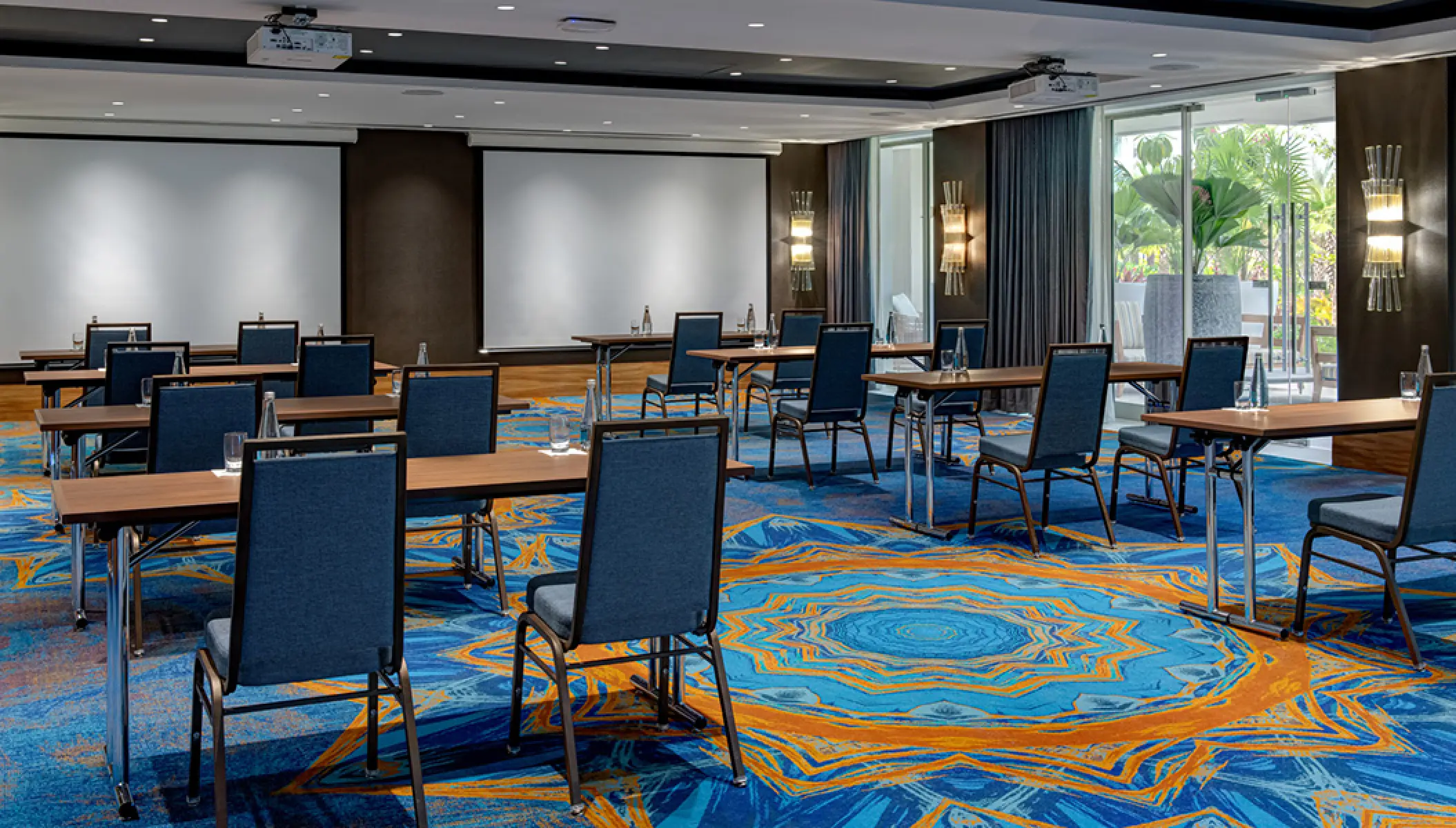 Xiriki school style meeting room with blue patterned carpet at Conrad Punta de Mita, Puerto Vallarta
