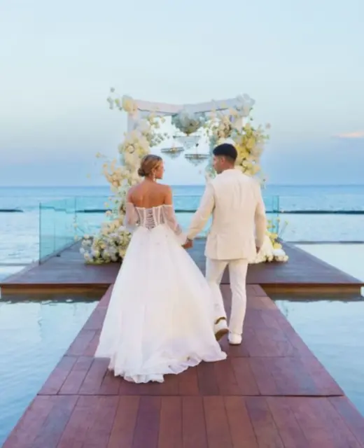 bride and groom at the infinity venue at Devossion by Live Aqua Playa del Carmen