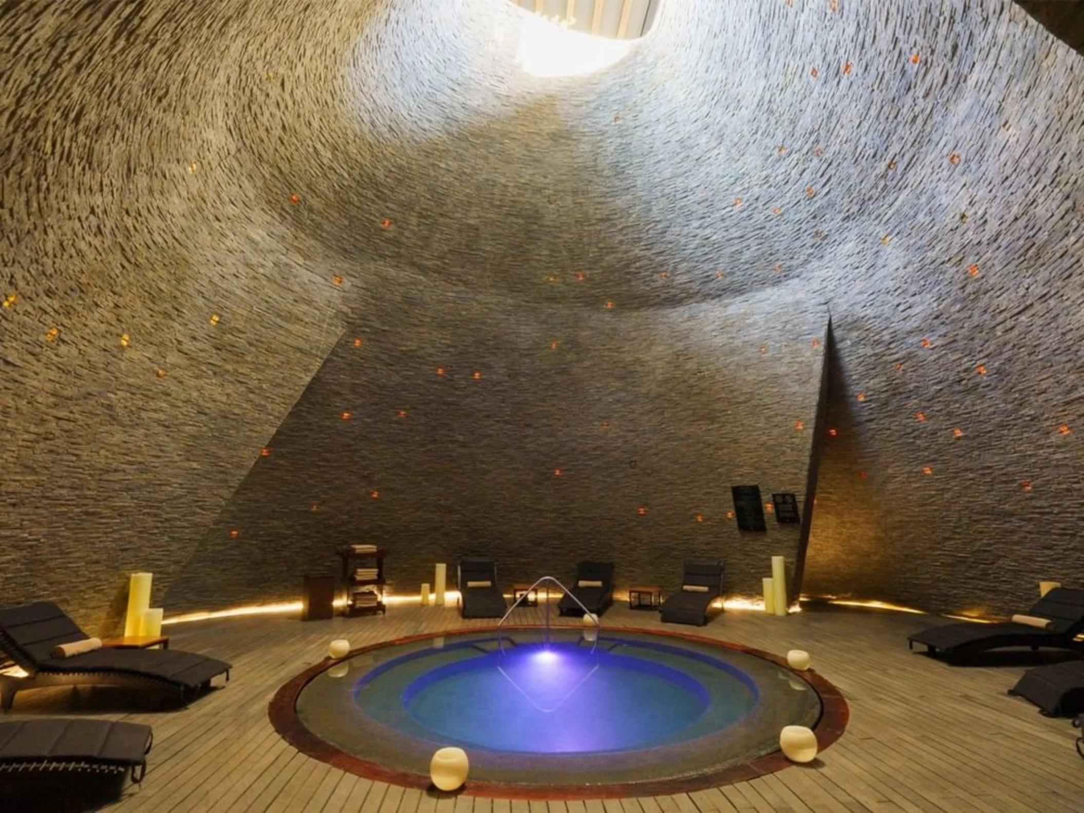 loungers by the spa pool at Devossion by Live Aqua Playa del Carmen