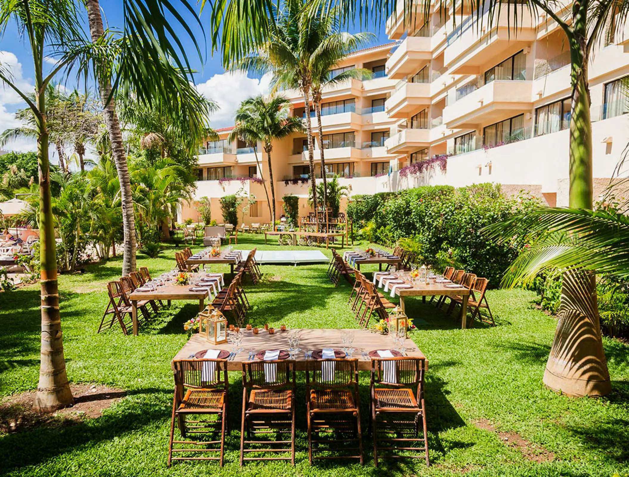 Garden wedding reception setup on the lawn at Dreams Aventuras, Riviera Maya