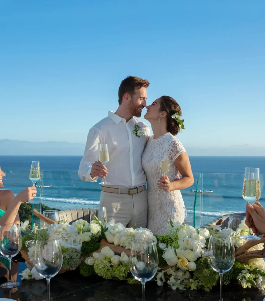 bride and groom raising a toast at dreams bahia mita