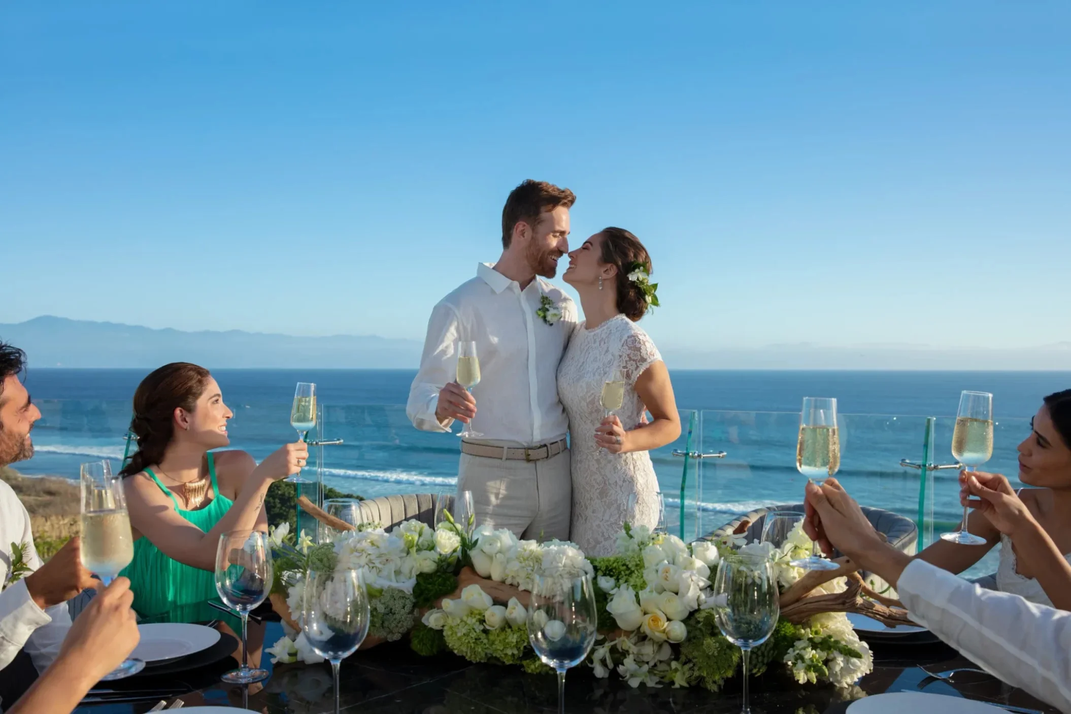 bride and groom raising a toast at dreams bahia mita