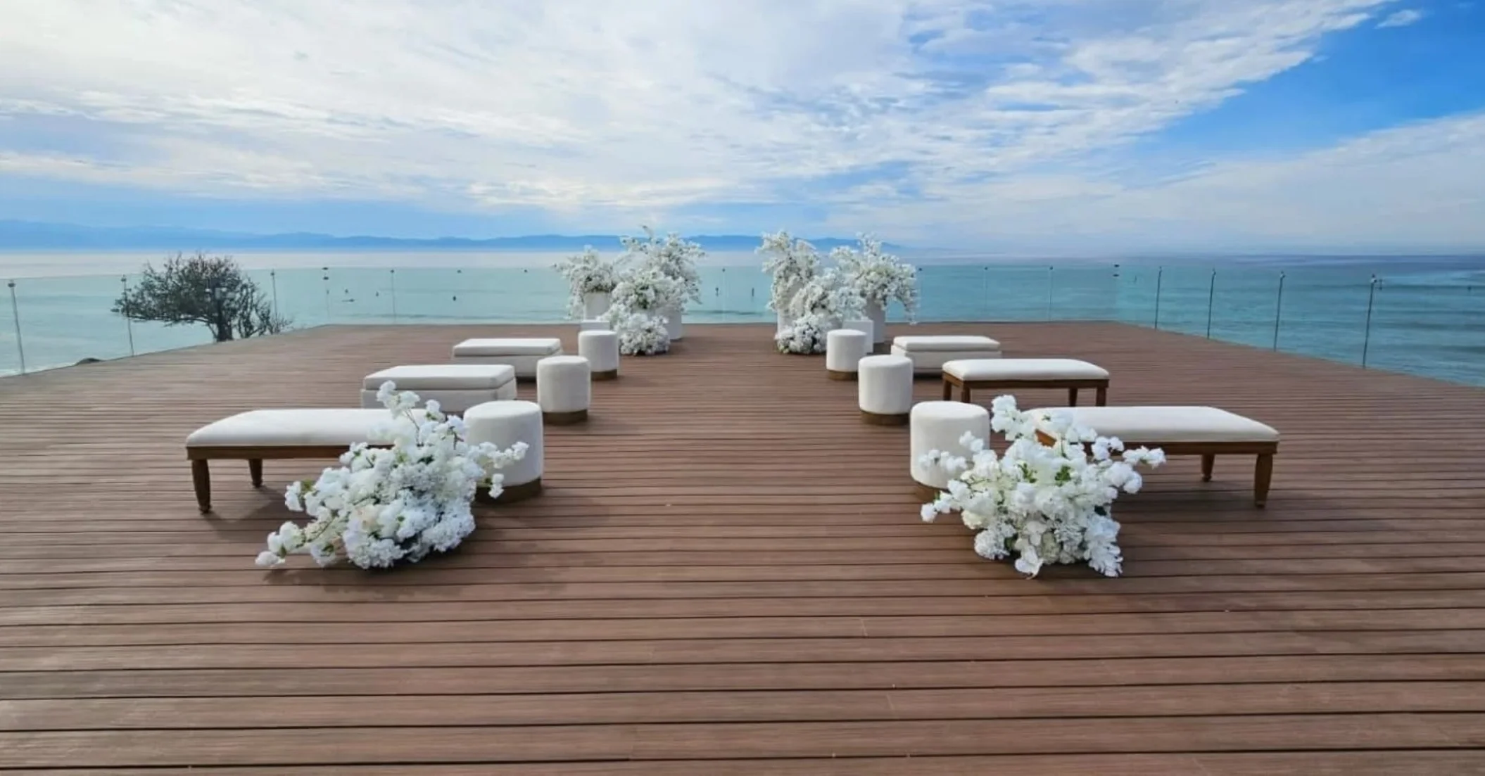 ceremony setup at the wooden deck at the beach garden at dreams and secrets bahia mita