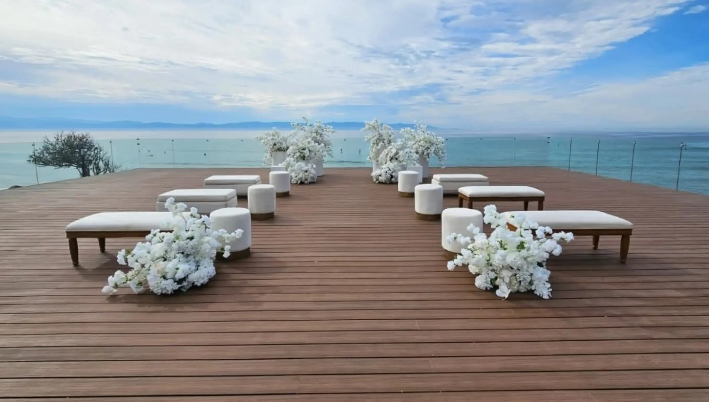 ceremony setup at the wooden deck at the beach garden at dreams and secrets bahia mita