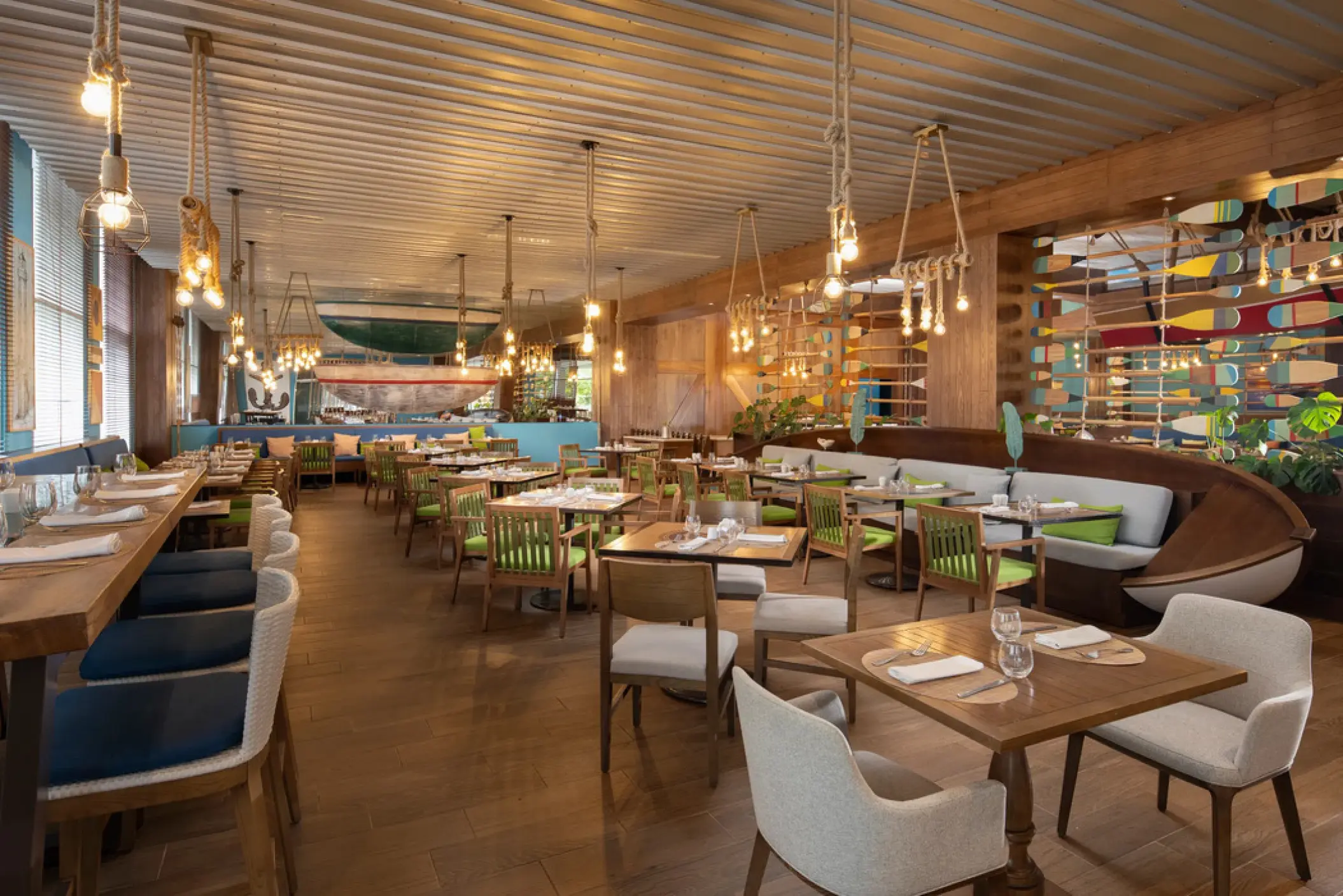 Buffet restaurant dining area with modern wood accents at Dreams Cap Cana, Punta Cana