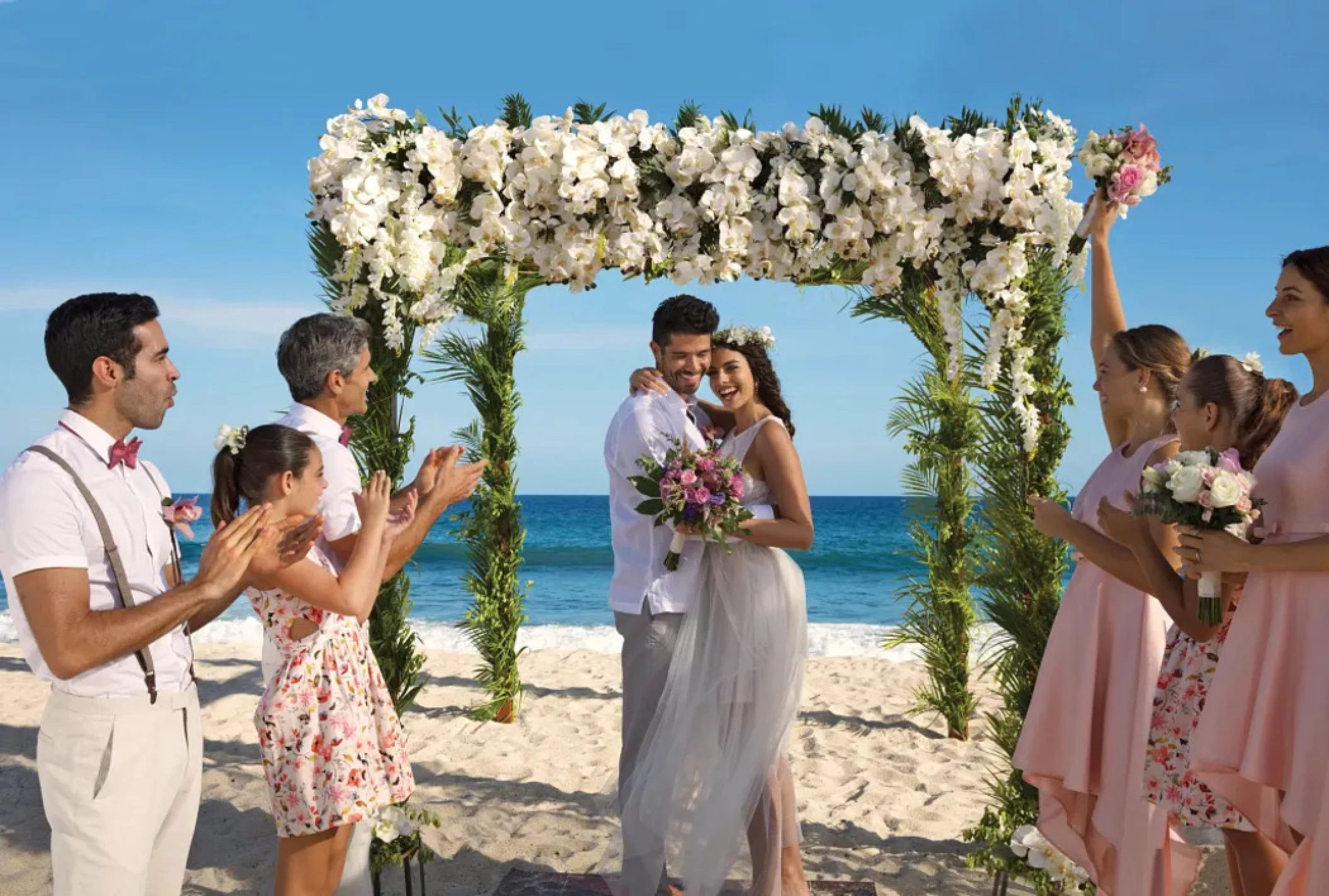 couple and guests at ceremony at dreams cap cana