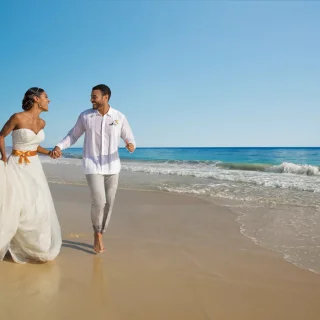 couple on the beach at dreams resort